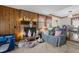 Inviting living room with a brick fireplace and ample space for relaxing and entertaining at 1525 Rogers Rd, Graham, NC 27253