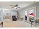A finished basement features access to the outdoors, a storage room, and a cozy sitting area at 153 Glenn Oak Dr, Sanford, NC 27332