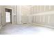 Unfinished bedroom featuring three doorways and grey walls at 1547 Pecan Drive # 31, Nashville, NC 27856