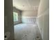 Unfinished bedroom featuring a large window and closet at 1547 Pecan Drive # 31, Nashville, NC 27856