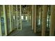 Spacious interior view of new construction home featuring wood framing and concrete flooring at 1547 Pecan Drive # 31, Nashville, NC 27856
