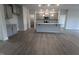 Modern kitchen featuring gray cabinets, granite countertops, stainless steel appliances and wood flooring at 1547 Pecan Drive # 31, Nashville, NC 27856