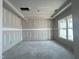 Unfinished living room featuring a large window and grey walls at 1547 Pecan Drive # 31, Nashville, NC 27856
