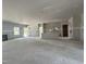 Unfinished open-concept living room featuring a fireplace and sliding door at 1547 Pecan Drive # 31, Nashville, NC 27856