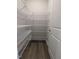 Walk-in pantry with ample wire shelving for organized storage solutions at 1547 Pecan Drive # 31, Nashville, NC 27856