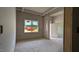 Unfinished bedroom with bright window view and white trim at 1565 Pecan Drive # 30, Nashville, NC 27856