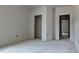 Unfinished bedroom with visible closet door frames and electrical wiring at 1565 Pecan Drive # 30, Nashville, NC 27856