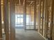 New construction framing reveals a home's open garage at 1565 Pecan Drive # 30, Nashville, NC 27856