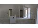 Unfinished living room showcasing open floor plan and doorway details at 1565 Pecan Drive # 30, Nashville, NC 27856