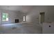 Unfinished living room featuring a fireplace and natural light at 1565 Pecan Drive # 30, Nashville, NC 27856