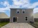 A patio view of the backyard with vinyl siding and a blue sky background at 2053 Alderman Way, Creedmoor, NC 27522