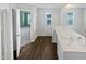 Bathroom boasts sleek vanity and doorway leading to a bright, inviting bedroom at 2053 Alderman Way, Creedmoor, NC 27522