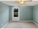 Bare bedroom features neutral walls, carpet and a bright window at 2053 Alderman Way, Creedmoor, NC 27522