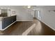 Spacious living room with hardwood floors leading to staircase at 2053 Alderman Way, Creedmoor, NC 27522