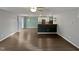 Spacious living room with kitchen view and hardwood floors at 2053 Alderman Way, Creedmoor, NC 27522