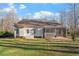Expansive backyard with screened porch and grilling area perfect for outdoor entertaining at 2053 Stillwood Dr, Youngsville, NC 27596