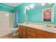 Charming bathroom with wood vanity and a view to bedroom at 2053 Stillwood Dr, Youngsville, NC 27596