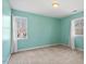 Bright bedroom with two windows and neutral carpet at 2053 Stillwood Dr, Youngsville, NC 27596
