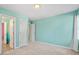 Bedroom featuring neutral walls, carpet, and multiple doorways at 2053 Stillwood Dr, Youngsville, NC 27596