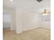 Spacious bonus room with neutral carpet and natural light at 2053 Stillwood Dr, Youngsville, NC 27596