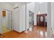 Grand foyer with soaring ceilings, hardwood floors, columns and elegant lighting fixtures at 2053 Stillwood Dr, Youngsville, NC 27596