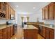 Spacious kitchen showcases granite countertops and stainless steel appliances at 2053 Stillwood Dr, Youngsville, NC 27596
