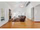 Open living room featuring fireplace and high ceilings at 2053 Stillwood Dr, Youngsville, NC 27596