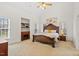 Main bedroom offers a lot of natural light and vaulted ceilings at 2053 Stillwood Dr, Youngsville, NC 27596