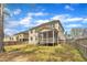 Spacious backyard with lawn and patio at 215 Mystic Pine Pl, Apex, NC 27539