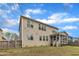 Home's exterior with a fenced backyard at 215 Mystic Pine Pl, Apex, NC 27539