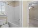 A bathroom with a tub/shower combo, and tile floor at 2308 Carriage Oaks Dr, Raleigh, NC 27614
