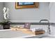 Close-up of soaking tub with decor and fixtures at 2554 Club Level Dr, Apex, NC 27523