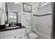 Bathroom with granite counters, vanity and tub at 2554 Club Level Dr, Apex, NC 27523