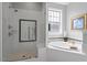Bathroom with soaking tub, separate shower with glass doors at 2554 Club Level Dr, Apex, NC 27523