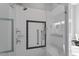 Shower with glass surround, shower seat and fixtures at 2554 Club Level Dr, Apex, NC 27523
