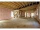 Living room's interior featuring exposed framing, insulation, and the layout of a comfortable living space at 2603 Vineyard St, Durham, NC 27707