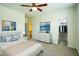 Bedroom featuring a TV, walk in closet, and adjacent bathroom for ultimate convenience and relaxation at 310 Shale Creek Dr, Durham, NC 27703