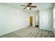 Large bedroom with carpet floors, ceiling fan, and ensuite bathroom at 310 Shale Creek Dr, Durham, NC 27703