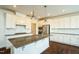 Modern kitchen with stainless steel appliances, granite counters and center island at 310 Shale Creek Dr, Durham, NC 27703