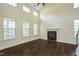 Living room featuring vaulted ceilings, fireplace, and hardwood floors at 310 Shale Creek Dr, Durham, NC 27703