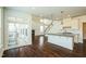 Open floorplan with living area featuring fireplace and kitchen with island at 310 Shale Creek Dr, Durham, NC 27703