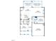 Open-concept first floor featuring a spacious kitchen, Gathering room, and guest bedroom at 3162 Armeria Dr, Apex, NC 27502