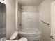 Clean white bathroom features a shower and bath, with sleek chrome fixtures at 350 Gilman Ln # 104, Raleigh, NC 27610