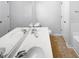 Bright bathroom with double vanity, ample counter space, and a neutral color scheme at 350 Gilman Ln # 104, Raleigh, NC 27610
