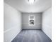Cozy bedroom with soft carpet, natural light, and white walls at 350 Gilman Ln # 104, Raleigh, NC 27610