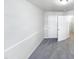 Neutral-toned bedroom with carpet flooring and freshly painted white walls at 350 Gilman Ln # 104, Raleigh, NC 27610