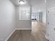 Open-concept dining room that features hardwood flooring and natural light at 350 Gilman Ln # 104, Raleigh, NC 27610