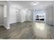 Spacious living room with hardwood floors and a bright atmosphere at 350 Gilman Ln # 104, Raleigh, NC 27610