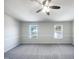 Spacious bedroom with carpeted floors, natural light, and neutral tones at 350 Gilman Ln # 104, Raleigh, NC 27610