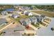 Residential area showcasing the two story homes with attached garages, manicured lawns, and paved streets at 36 Labradoodle Ct, Garner, NC 27529